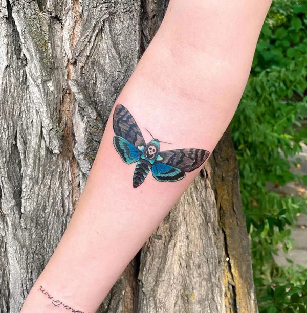Death moth tattoo 63