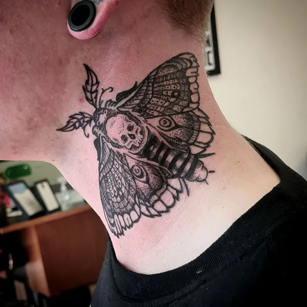 Death moth tattoo 7