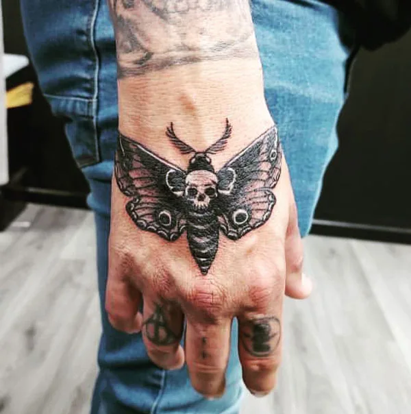 Death moth tattoo 70