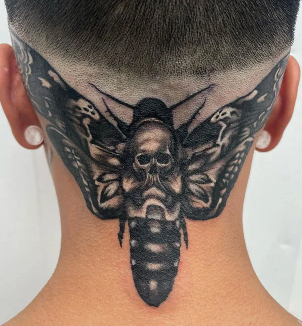 Death moth tattoo 77