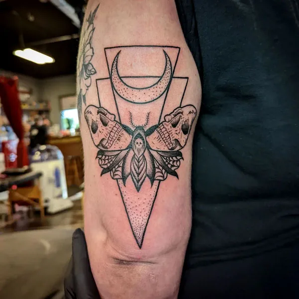 Geometric death moth tattoo