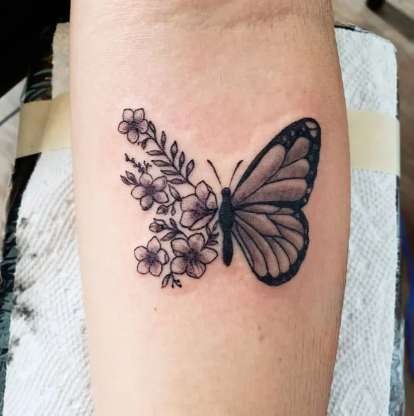 Half butterfly half flower tattoo 14