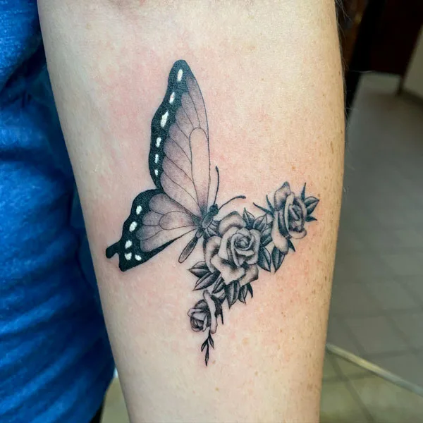 Half butterfly half flower tattoo 15