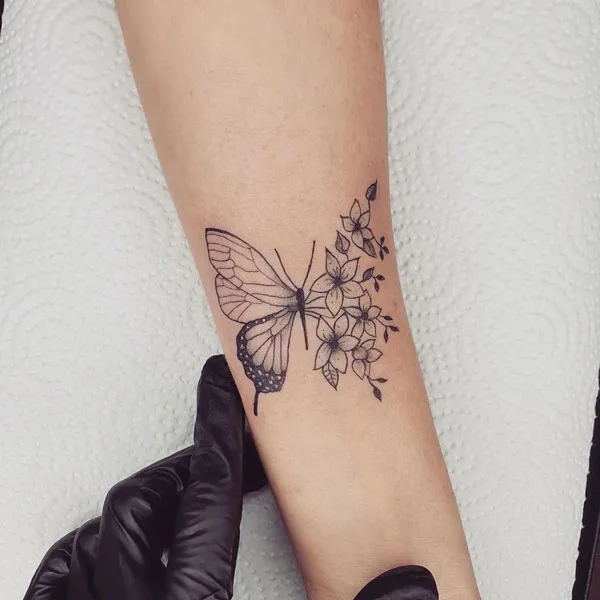 Half butterfly half flower tattoo 58