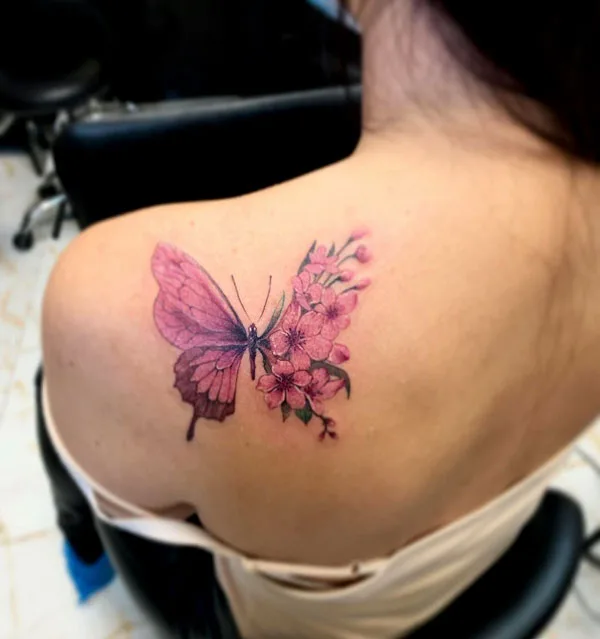 Half butterfly half flower tattoo 7