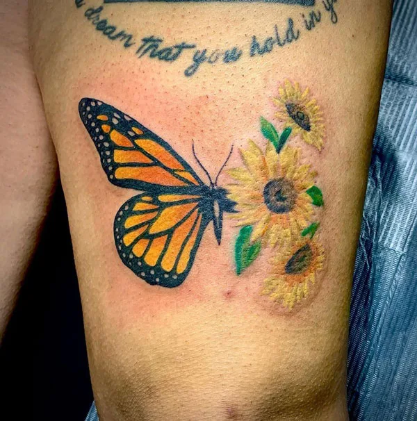 Half butterfly half flower tattoo 70