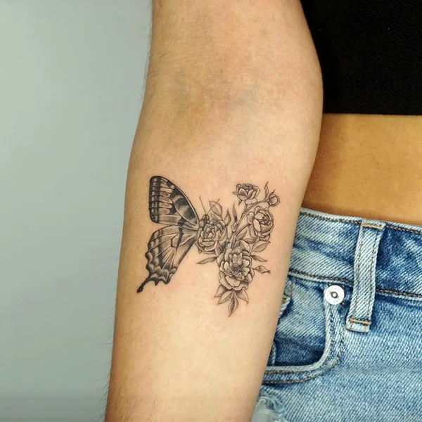 Half butterfly half flower tattoo 8