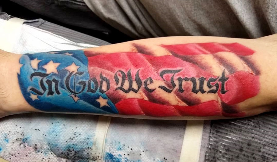 In god we trust tattoo