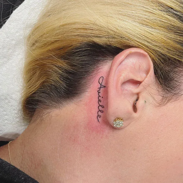 Name tattoo behind ear
