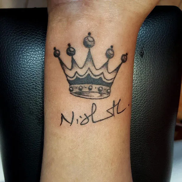 Name tattoo with crown