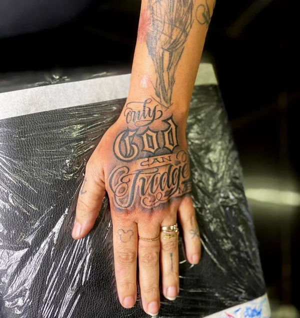Only god can judge me tattoo hand