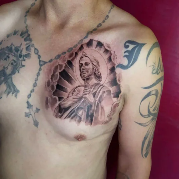 San Judas tattoo chest
