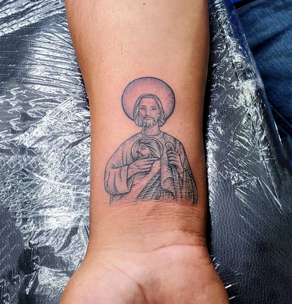 San Judas wrist tattoo