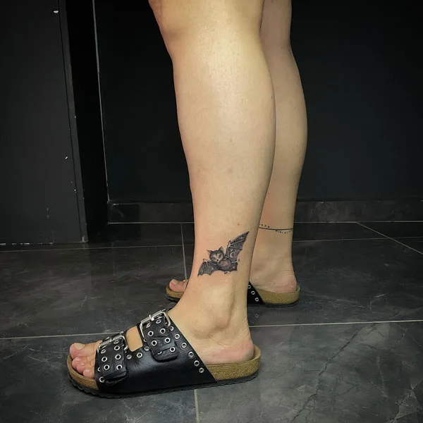 Small bat tattoo
