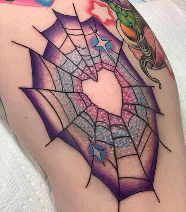 Spider web heart tattoo