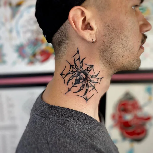 Spider web neck tattoo