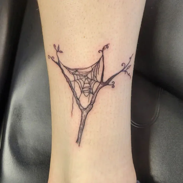 Spider web tattoo 18