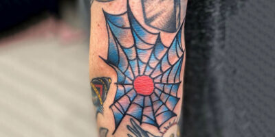 Spider web tattoo