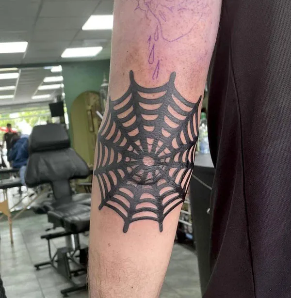 Spider web tattoo 56