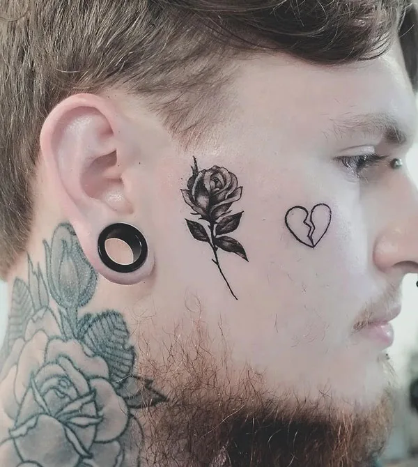 Broken heart tattoo on face