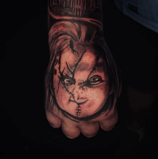 Chucky hand tattoo