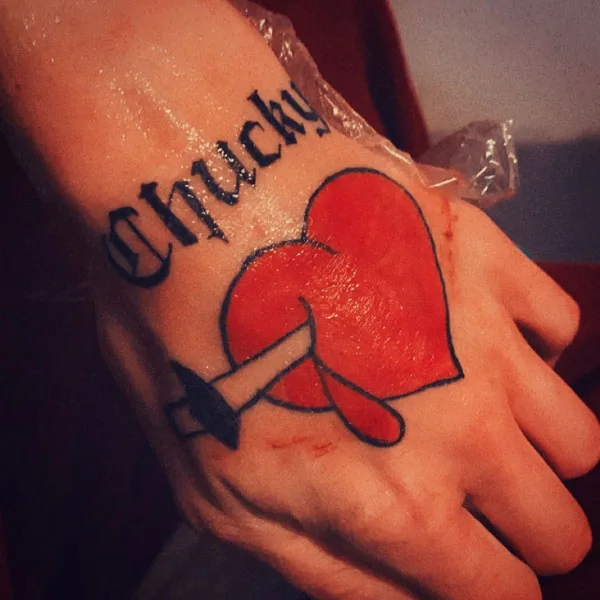 Chucky heart tattoo