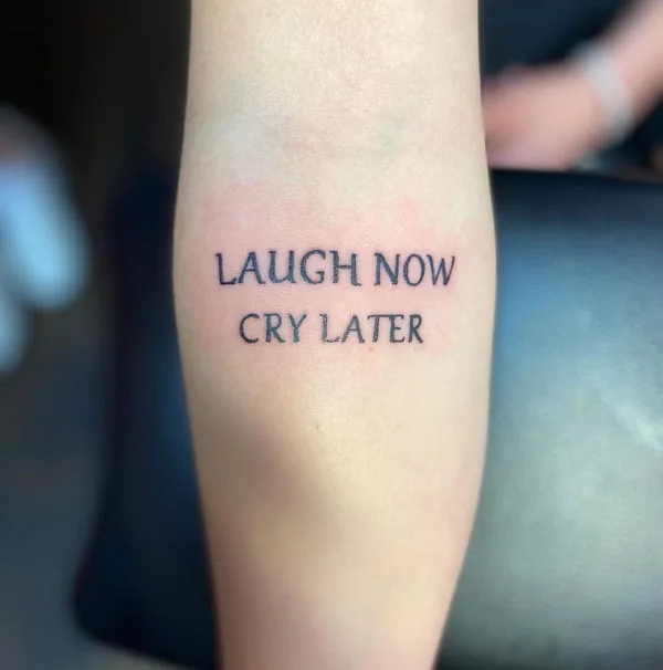 Laugh now cry later tattoo 21