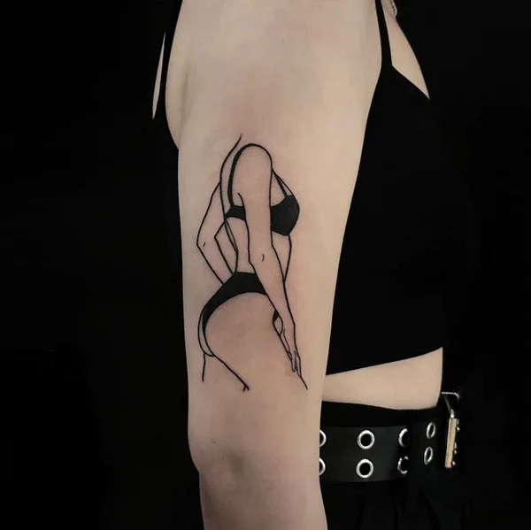 Naked women arm tattoo