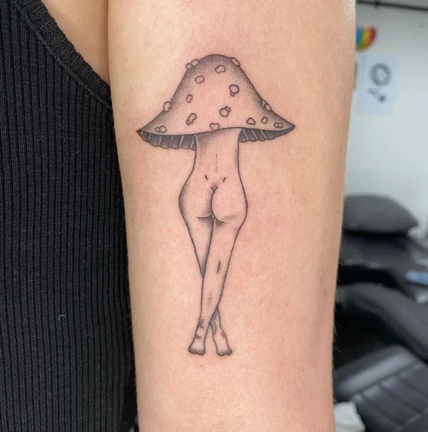 Naked women mushroom tattoo