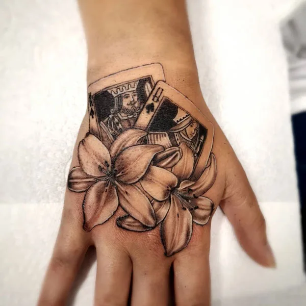 Queen of spade hand tattoo