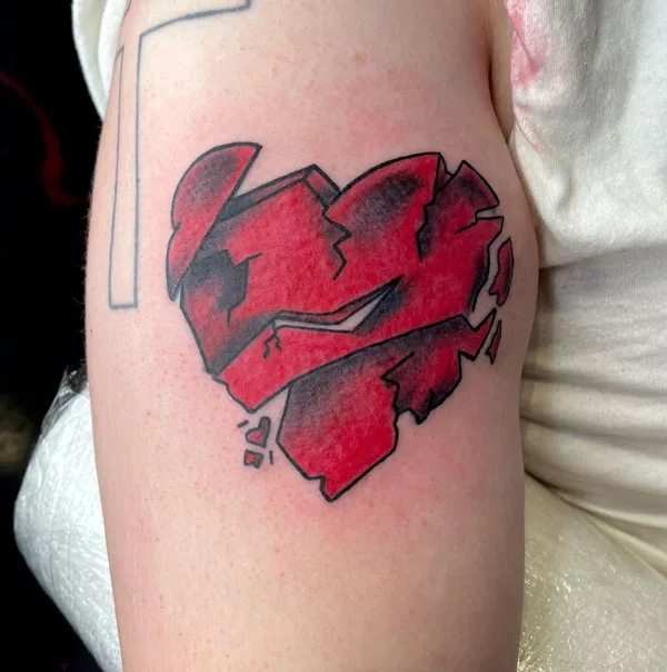 Red broken heart tattoo