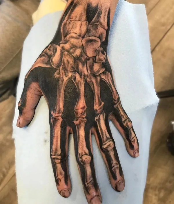 Skeleton hand tattoo 24