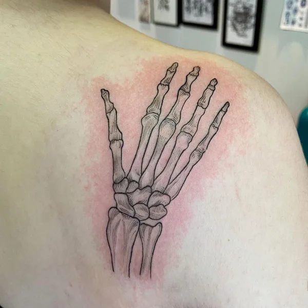 Skeleton hand tattoo 30