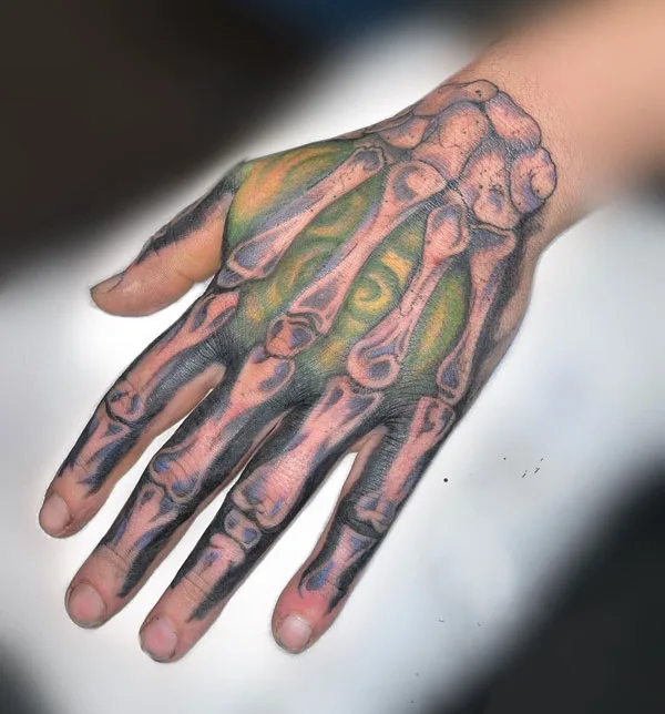 Skeleton hand tattoo 85