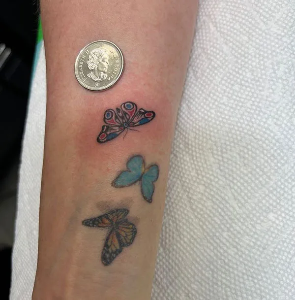 Small butterfly tattoo 104