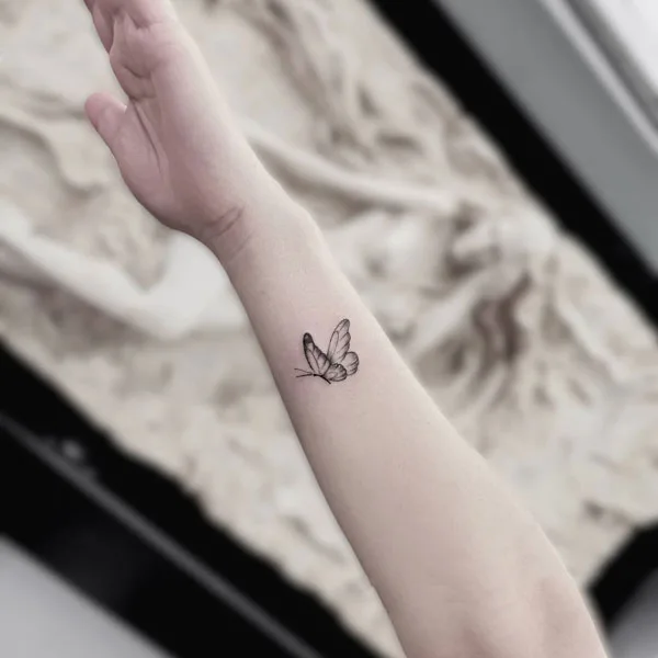 Small butterfly tattoo 24