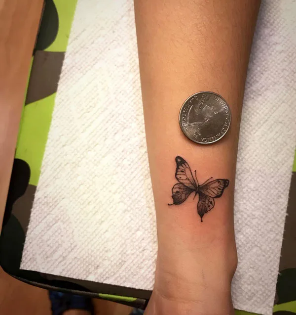 Small butterfly tattoo 6
