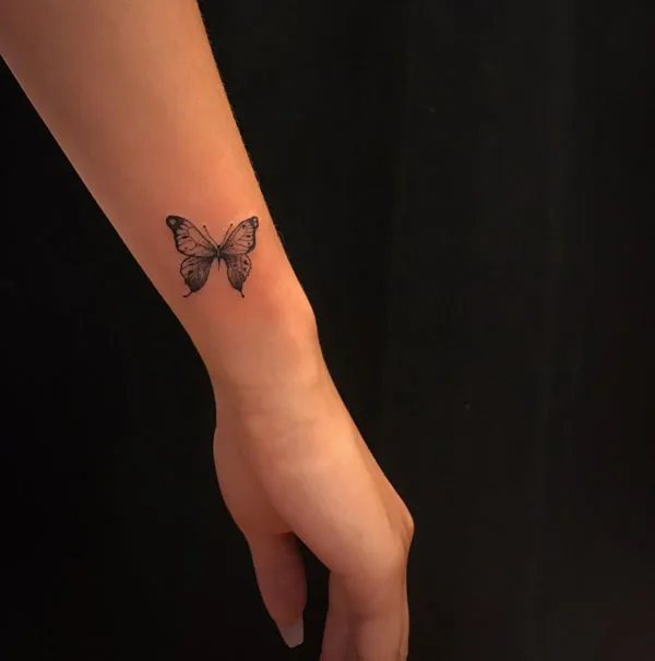 Small butterfly tattoo 7