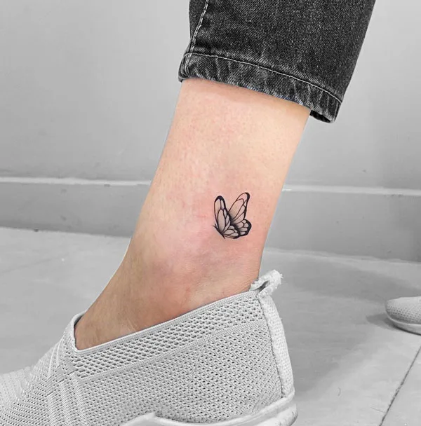 Small butterfly tattoo on ankle