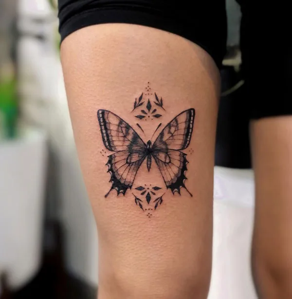 Butterfly thigh tattoo 1