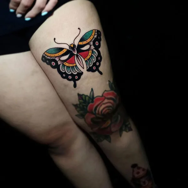 Butterfly thigh tattoo 15