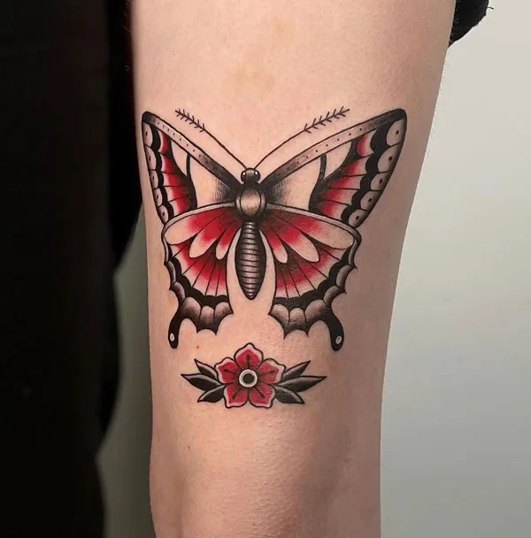 Butterfly thigh tattoo 16