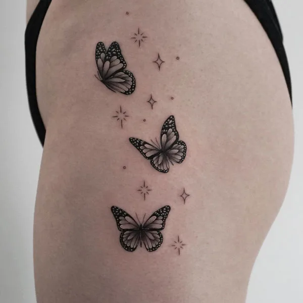 Butterfly thigh tattoo 22
