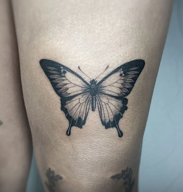 Butterfly thigh tattoo 26
