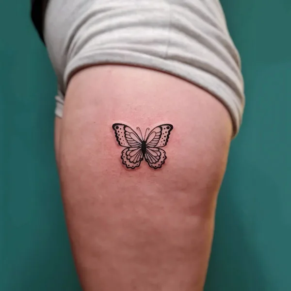 Butterfly thigh tattoo 3
