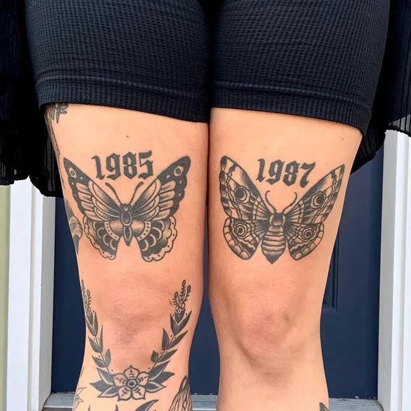 Butterfly thigh tattoo 31