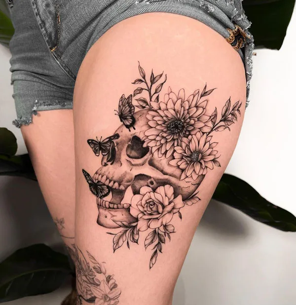 Butterfly thigh tattoo 38