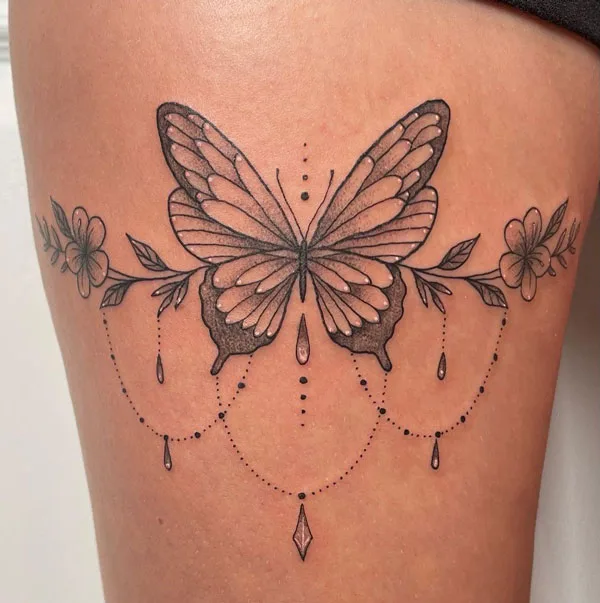 Butterfly thigh tattoo 39
