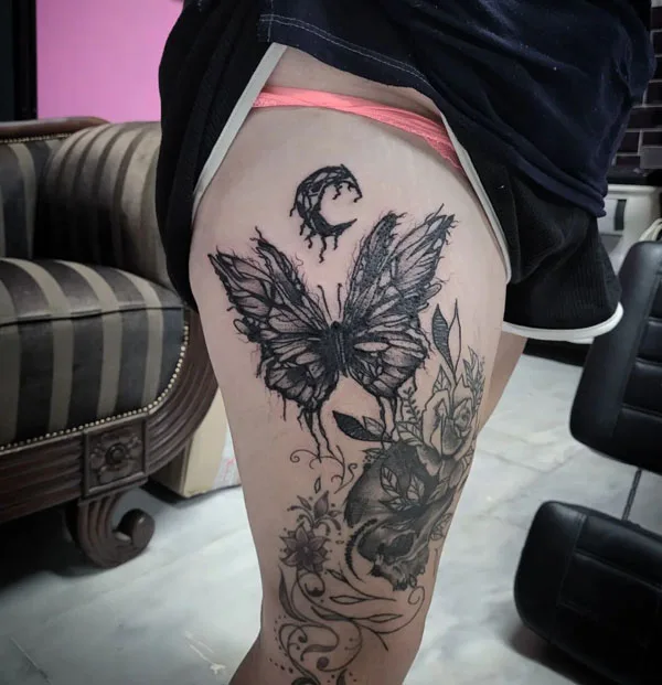 Butterfly thigh tattoo 4