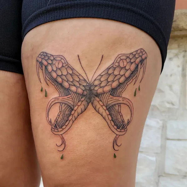 Butterfly thigh tattoo 41